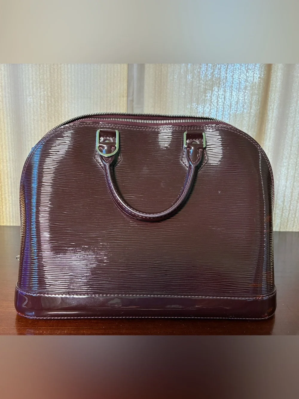 Louis Vuitton polished patent
